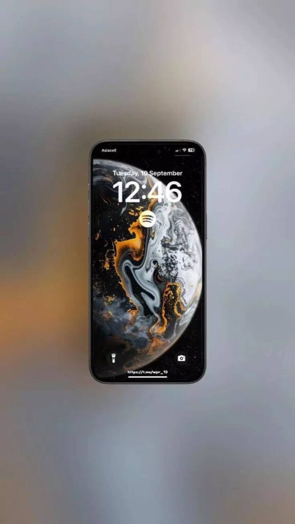 4K Abstract Marble Planet Wallpaper Mockup: See how this vibrant wallpaper looks on an iPhone, showcasing its unique cosmic marble design.